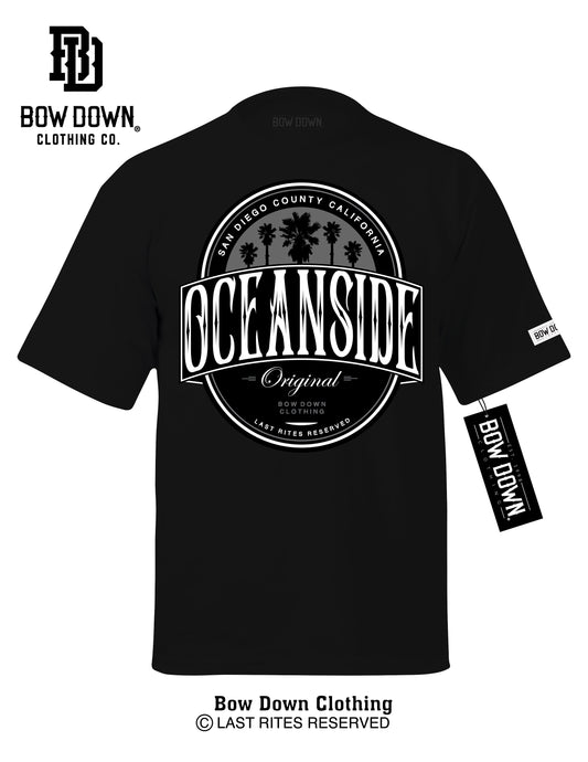 Black t-shirt with 'Oceanside' graphic and 'Bow Down Clothing Co.' branding on a white background.